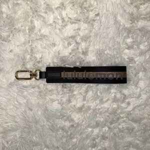 Lululemon Keychain in Black & Gold
